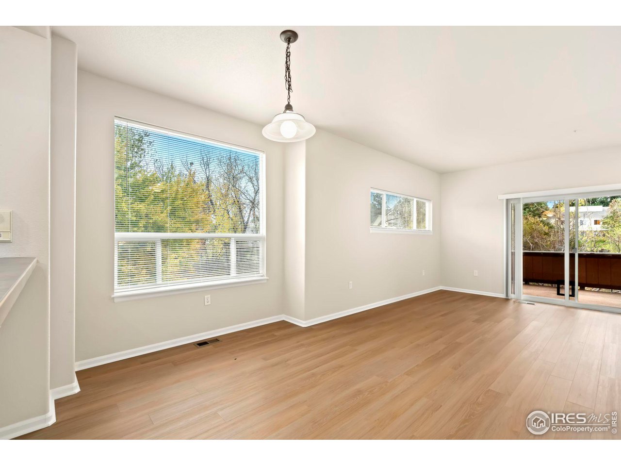 1221 East Prospect Road, Unit 5 Fort Collins, CO 80525 - Photo 9 of 38 Dining Room w/Large Picture Window