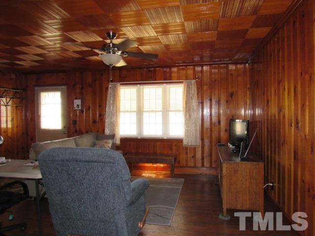 2695 Johnston County Road Angier, NC 27501 - Photo 14 of 25 a living room with furniture and a chandelier