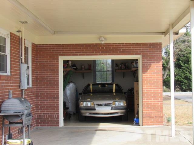 2695 Johnston County Road Angier, NC 27501 - Photo 19 of 25 a car parked in front of a building