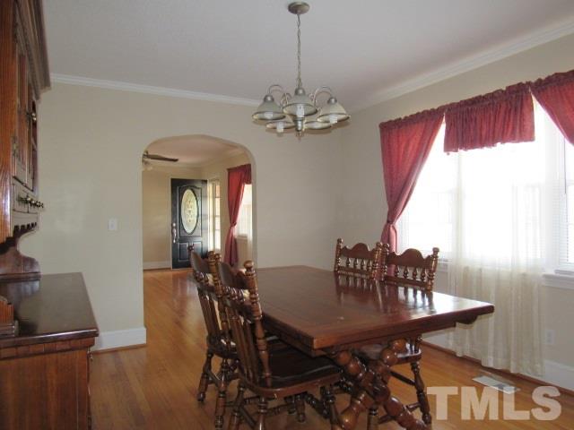 2695 Johnston County Road Angier, NC 27501 - Photo 6 of 25 a view of a dining room with furniture and window
