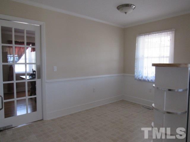 2695 Johnston County Road Angier, NC 27501 - Photo 7 of 25 an empty room with windows