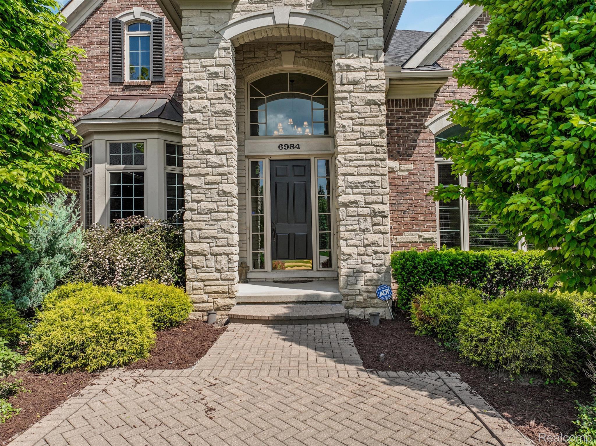 6984 Oakhurst Ridge Road Clarkston, MI 48348 - Photo 12 of 65 Inviting Front Entrance