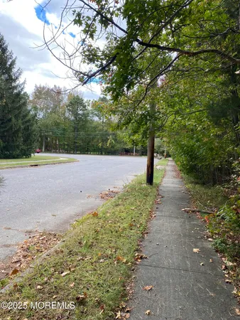 a view of a road with an outdoor space