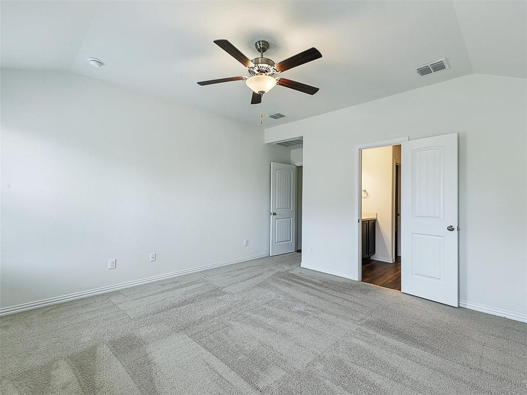 910 Torrey Avenue Princeton, TX 75407 - Photo 20 of 39 an empty room with closet and ceiling fan