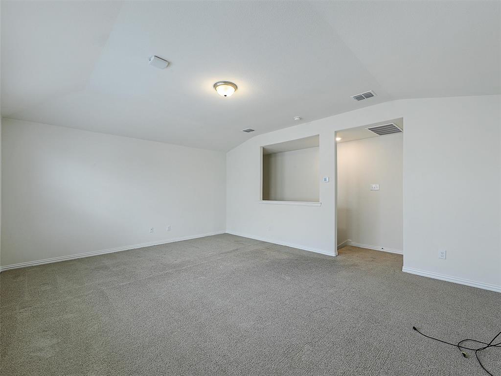 910 Torrey Avenue Princeton, TX 75407 - Photo 34 of 39 an empty room with windows