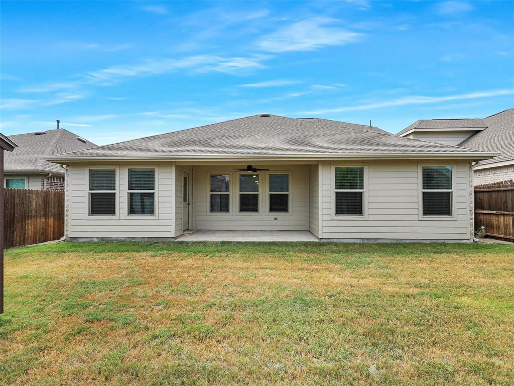 910 Torrey Avenue Princeton, TX 75407 - Photo 38 of 39 a view of a house with a swimming pool