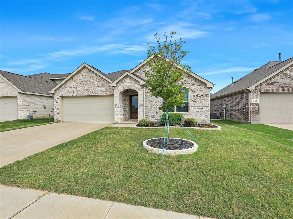 910 Torrey Avenue Princeton, TX 75407 - Photo 39 of 39 a front view of a house with a yard