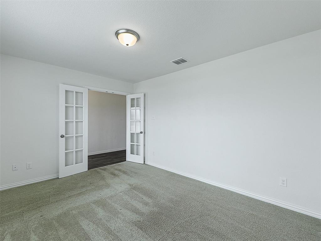 910 Torrey Avenue Princeton, TX 75407 - Photo 5 of 39 a view of an empty room