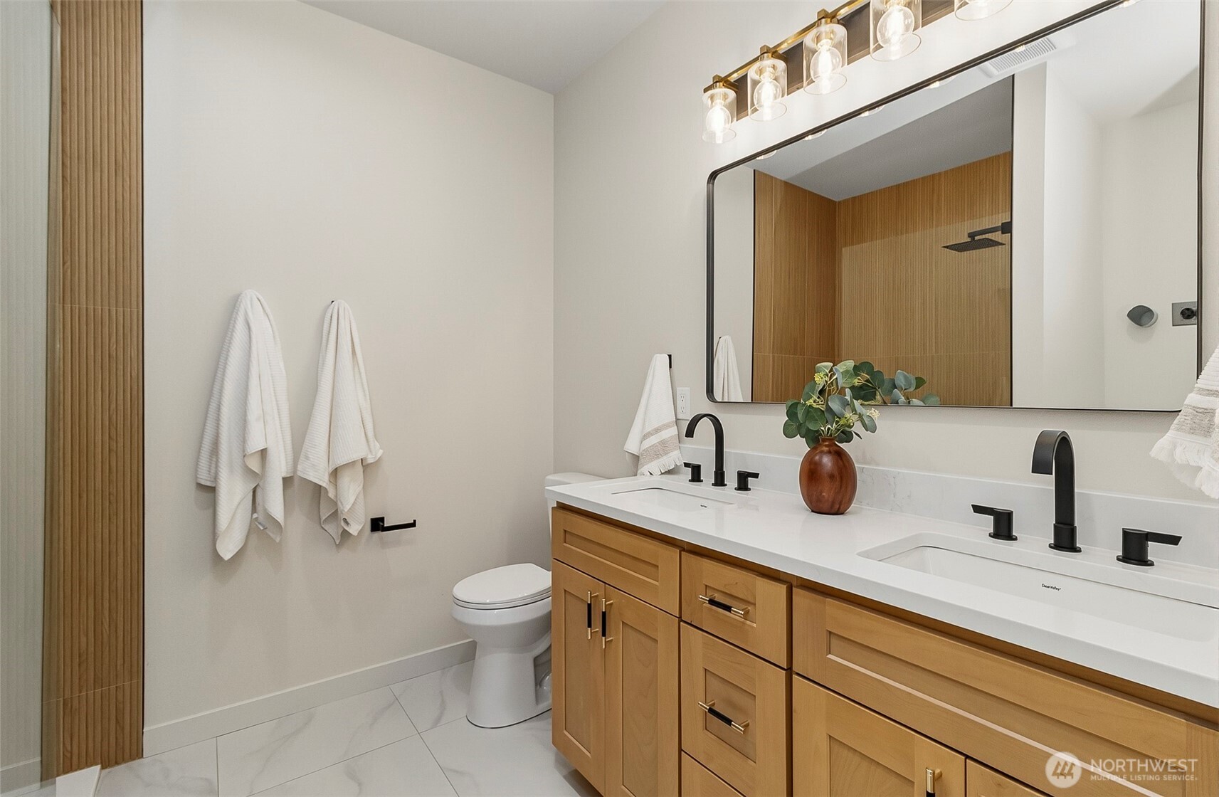 2816 Callow Road Lake Stevens, WA 98258 - Photo 11 of 34 a bathroom with a sink a toilet and a mirror