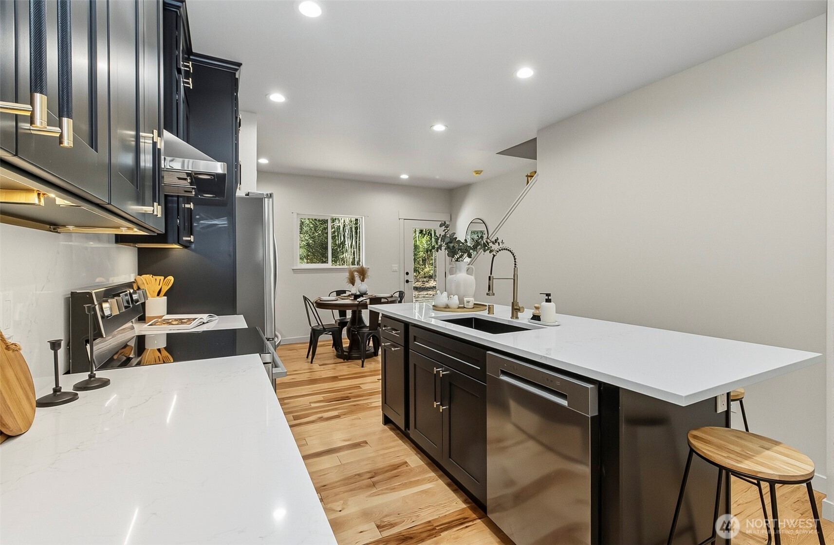 2816 Callow Road Lake Stevens, WA 98258 - Photo 13 of 34 a kitchen with stainless steel appliances granite countertop a sink a stove and a refrigerator