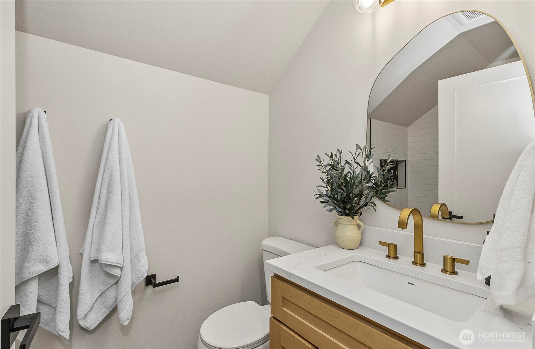 2816 Callow Road Lake Stevens, WA 98258 - Photo 21 of 34 a bathroom with a sink toilet and mirror
