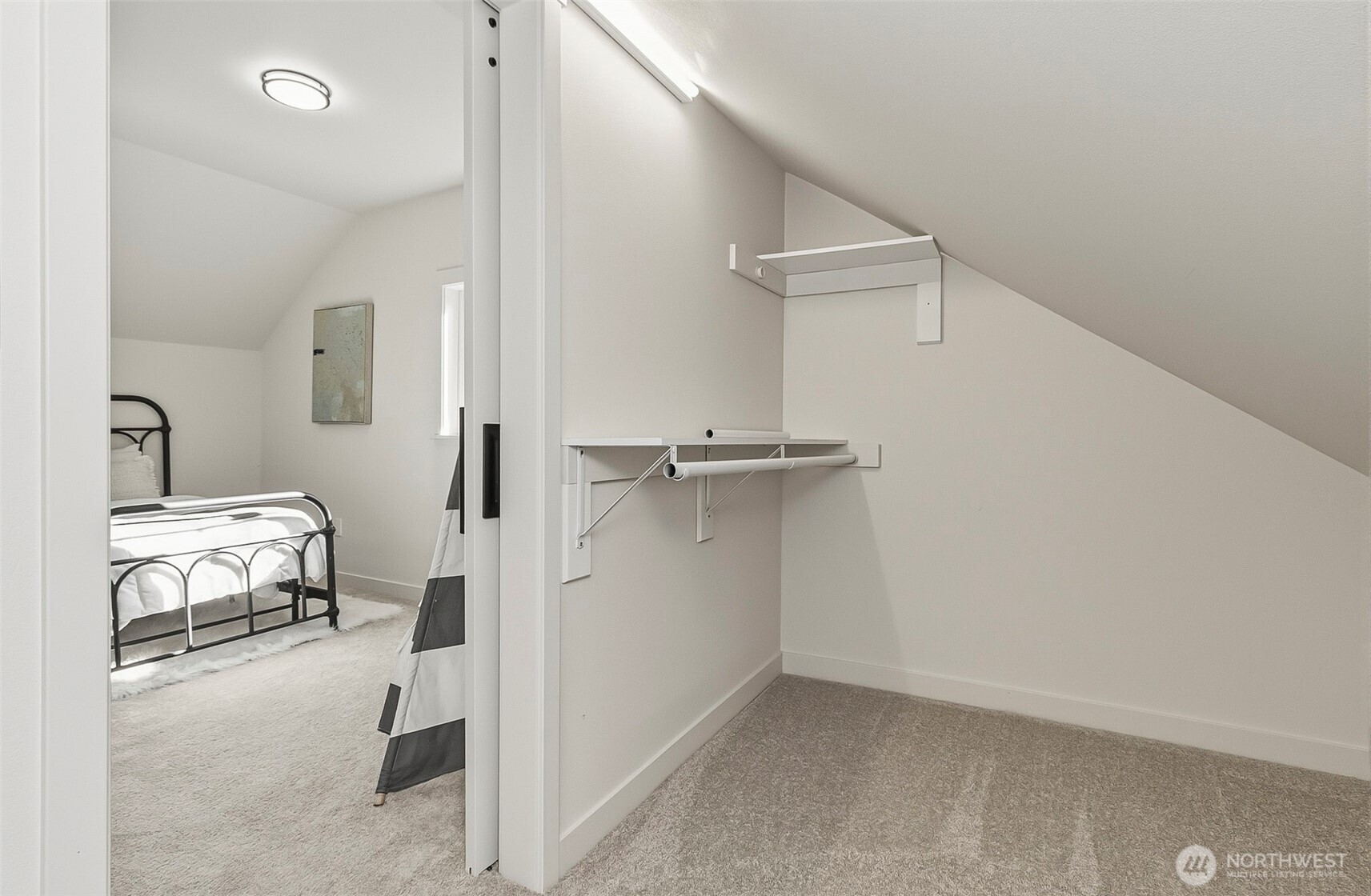 2816 Callow Road Lake Stevens, WA 98258 - Photo 25 of 34 a view of a bedroom with a bed and a window