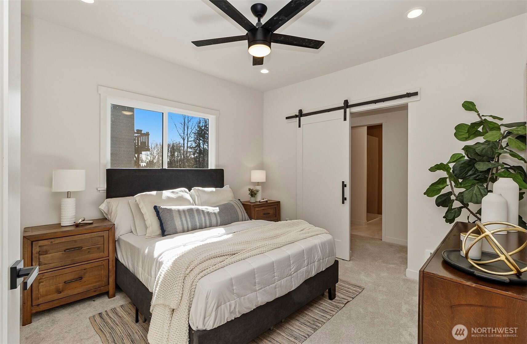 2816 Callow Road Lake Stevens, WA 98258 - Photo 9 of 34 a bedroom with a bed and a potted plant