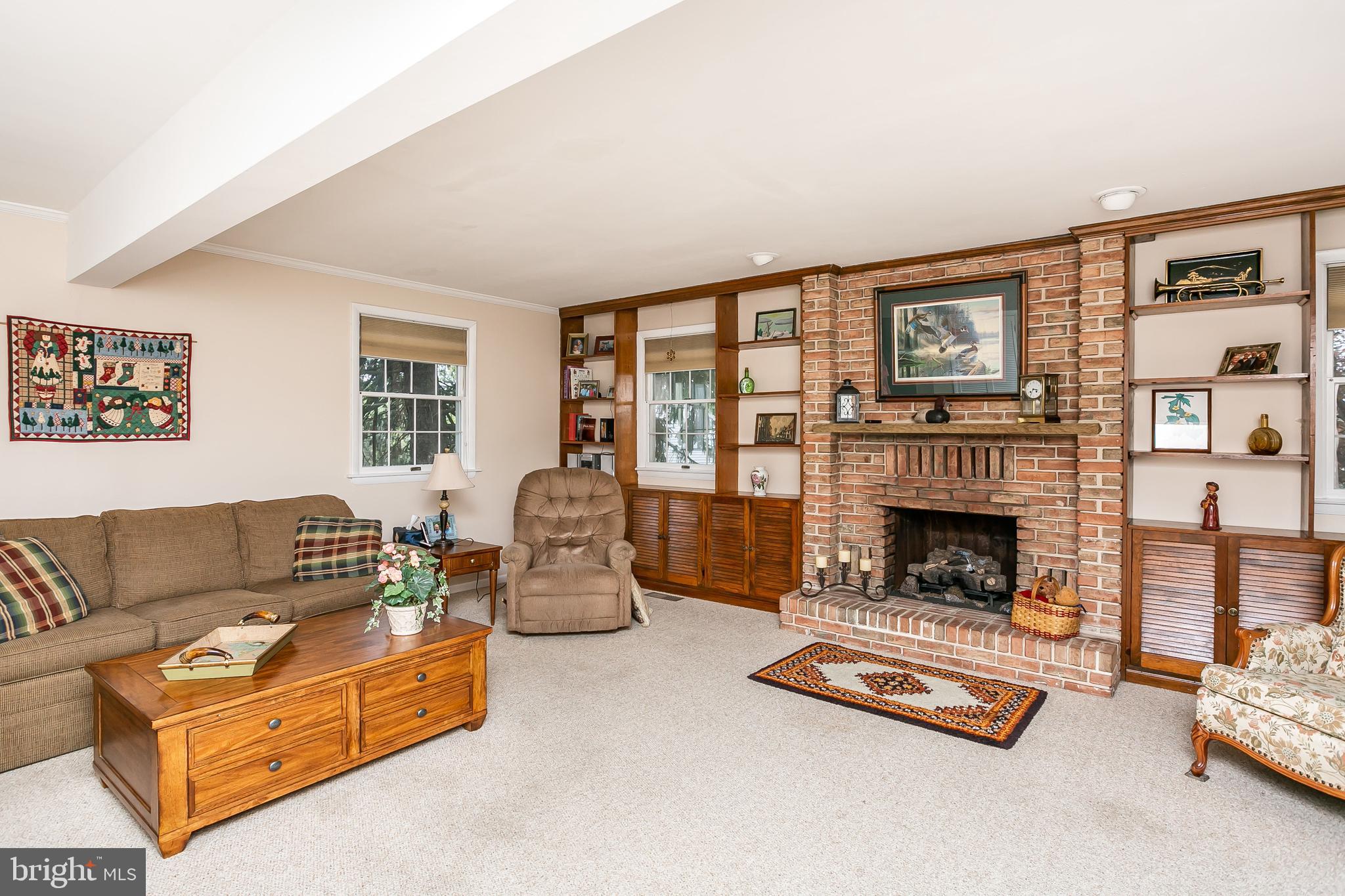 914 Breezewick Road Baltimore, MD 21286 - Photo 9 of 26 Large Family Room with Fireplace and Built-ins