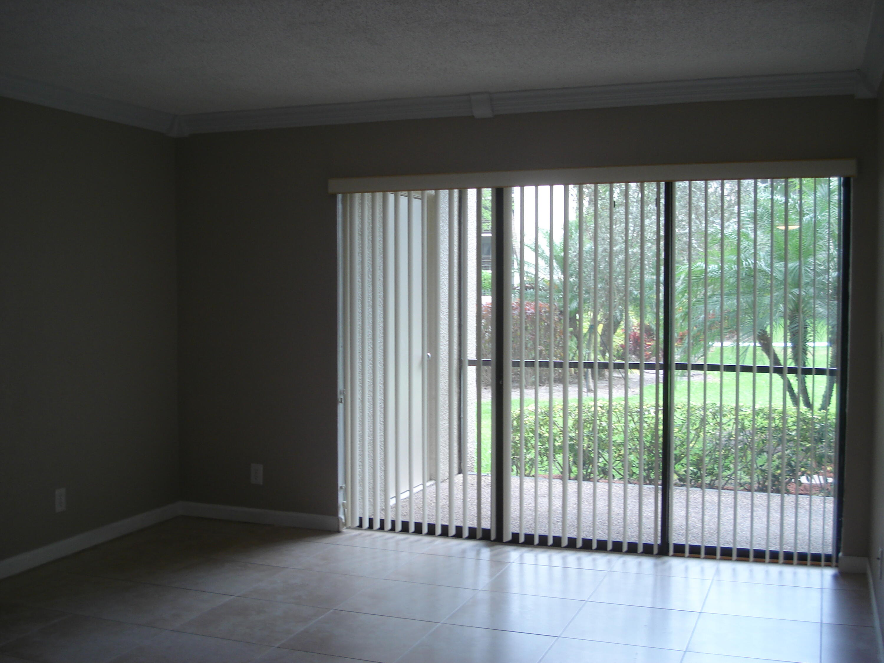 5750 Camino Del Sol, Unit 104 Boca Raton, FL 33433 - Photo 11 of 35 Living Room Sliders