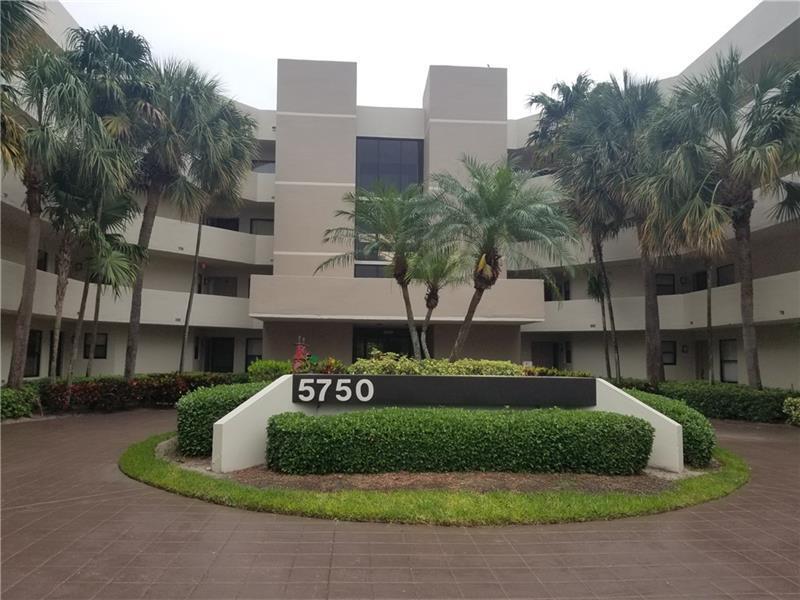 5750 Camino Del Sol, Unit 104 Boca Raton, FL 33433 - Photo 2 of 35 Front of Building