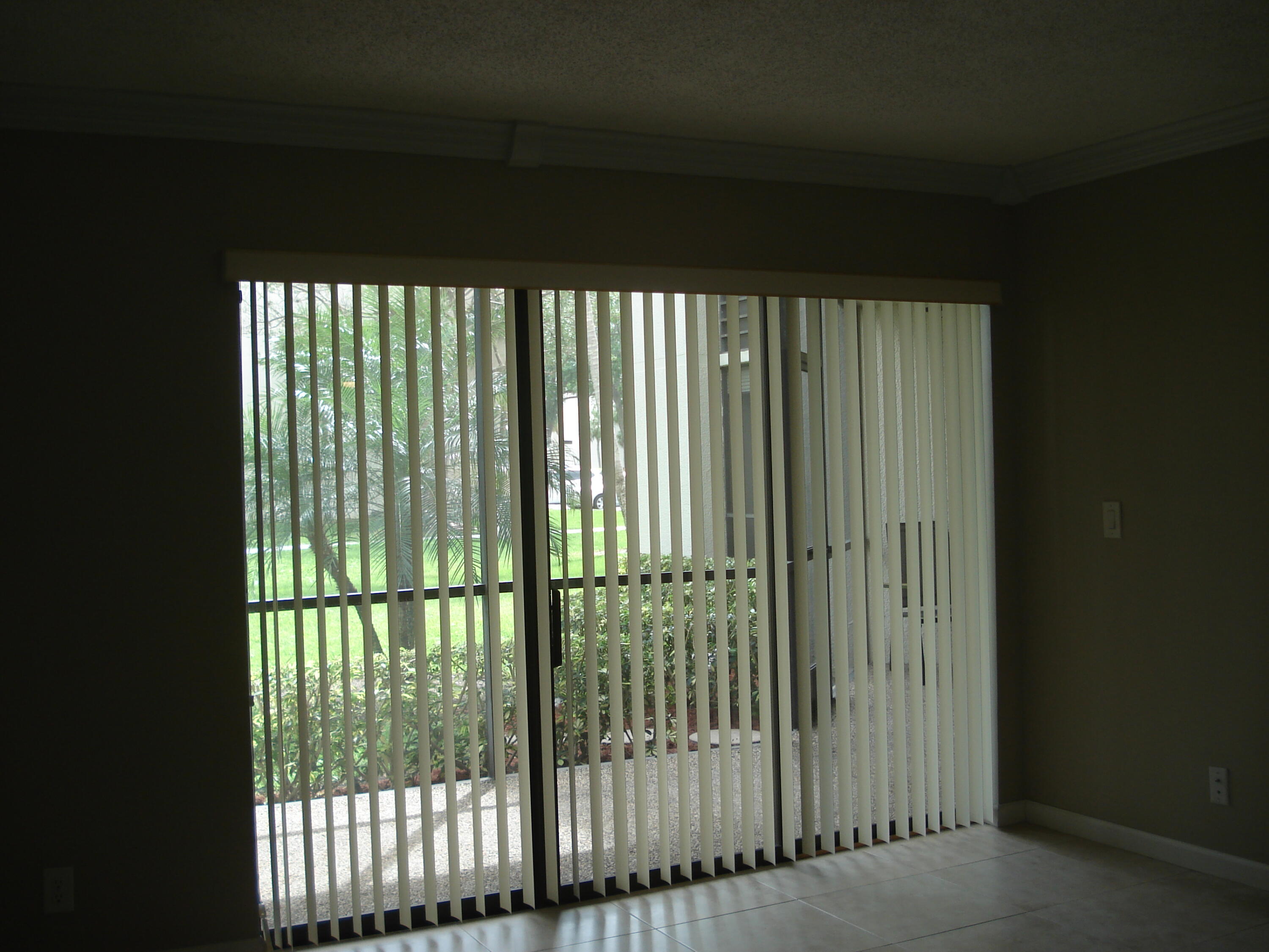 5750 Camino Del Sol, Unit 104 Boca Raton, FL 33433 - Photo 9 of 35 Slider to Patio