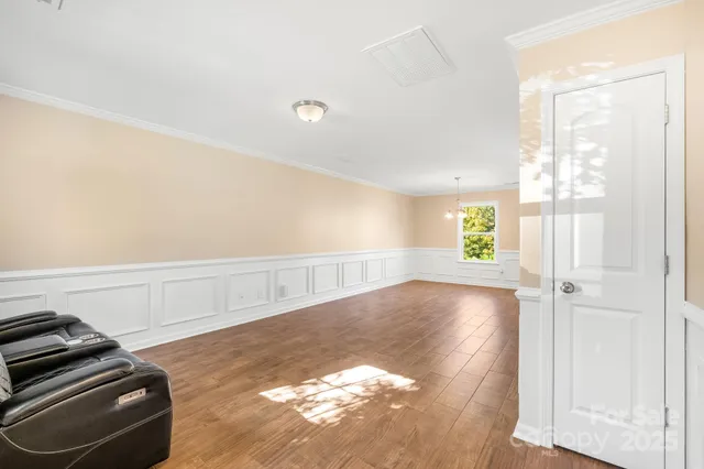 a view of an empty room and window