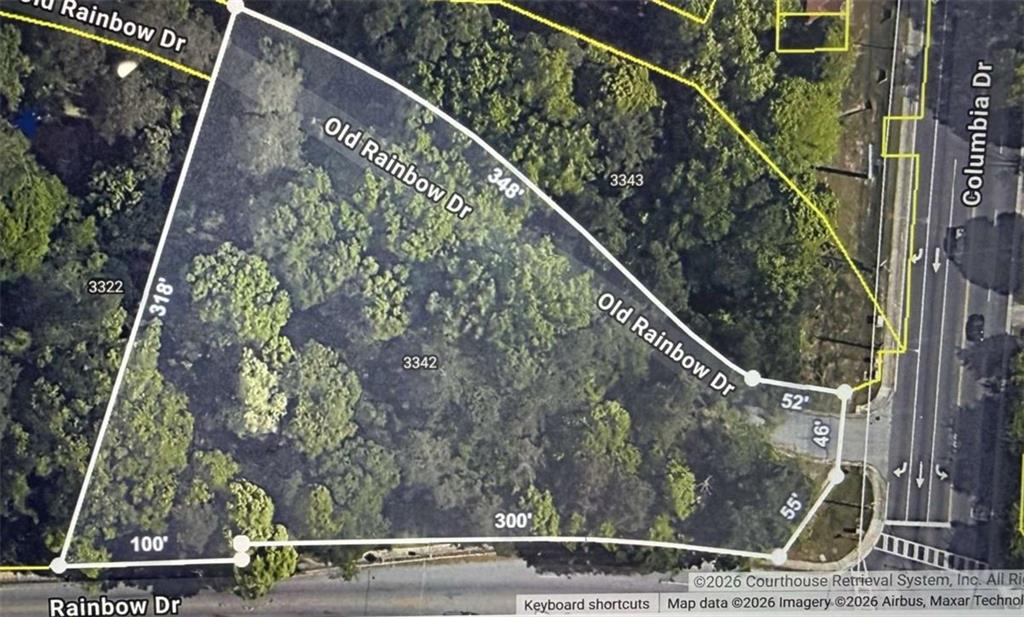 3342 Rainbow Drive Decatur, GA 30034 - Photo 2 of 4 a view of staircase with railing and a potted plant