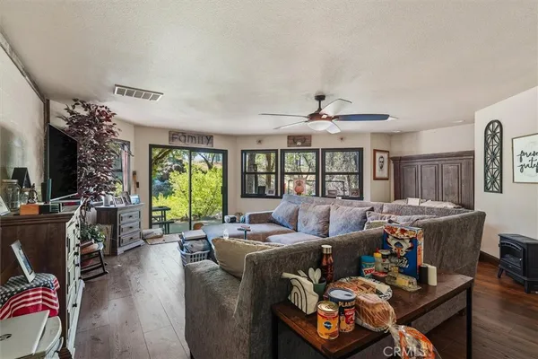 a view of a chairs and table in a patio