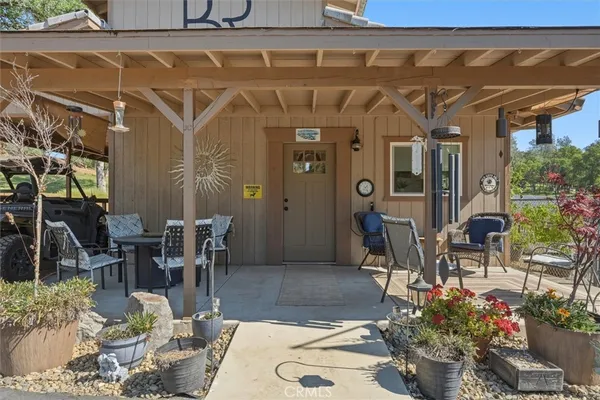 a bedroom with a bed and flat screen tv