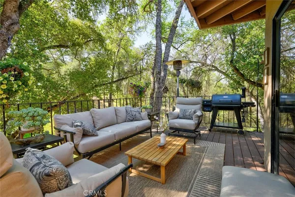 a view of outdoor dining space with a patio