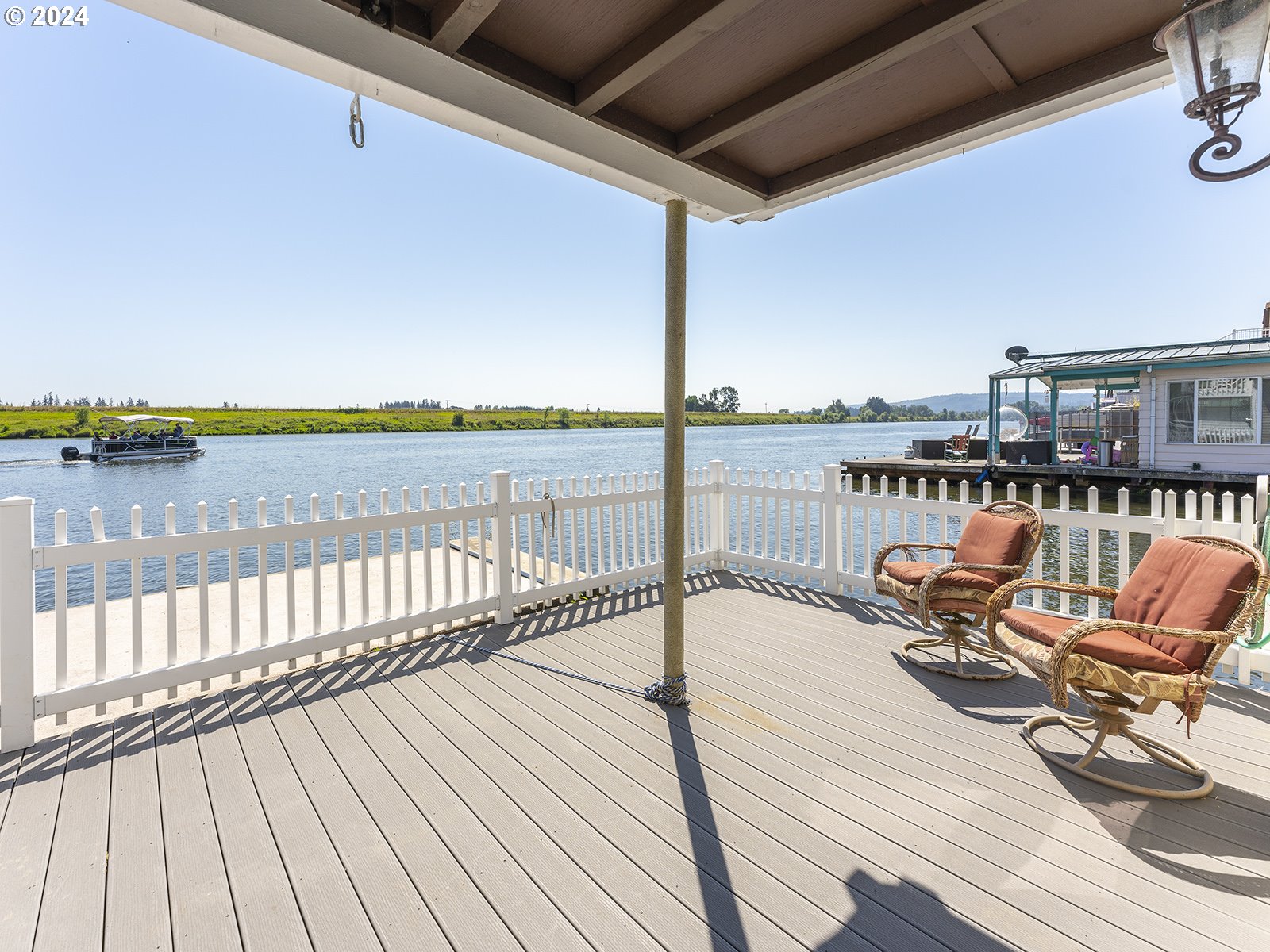 23560 Northwest St Helens Road, Unit N4 Portland, OR 97231 - Photo 29 of 37 a balcony with outdoor seating