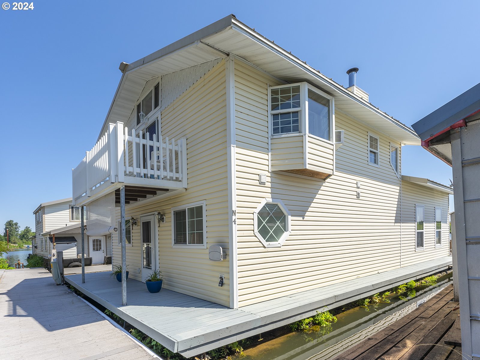 23560 Northwest St Helens Road, Unit N4 Portland, OR 97231 - Photo 3 of 37 a view of a white building