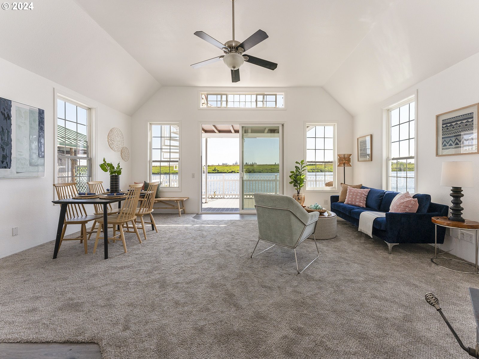 23560 Northwest St Helens Road, Unit N4 Portland, OR 97231 - Photo 4 of 37 a living room with furniture and a large window