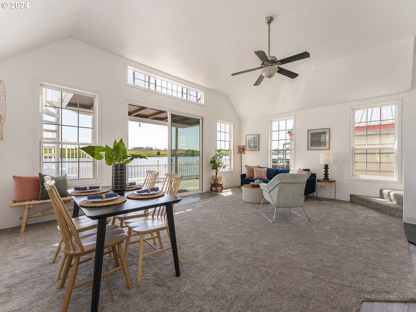 23560 Northwest St Helens Road, Unit N4 Portland, OR 97231 - Photo 5 of 37 a living room with furniture and a large window