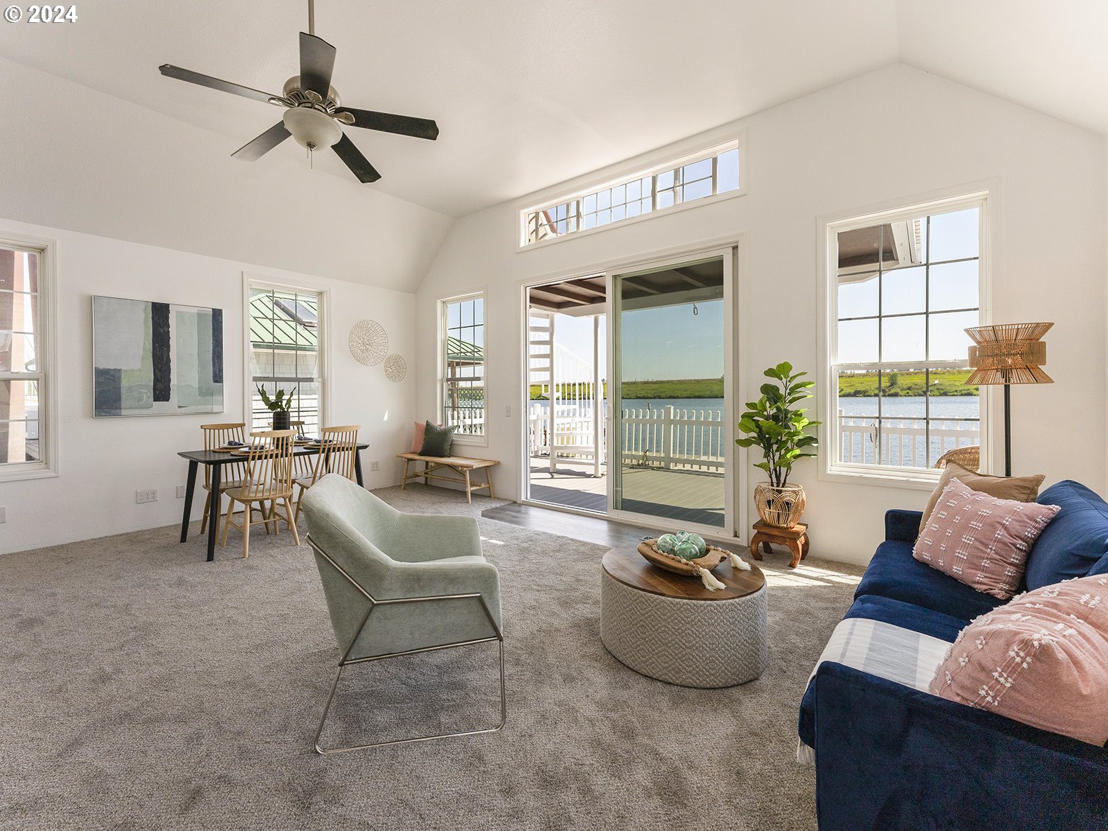 23560 Northwest St Helens Road, Unit N4 Portland, OR 97231 - Photo 6 of 37 a living room with furniture and a large window