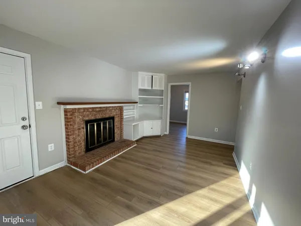 a view of a livingroom with a fireplace