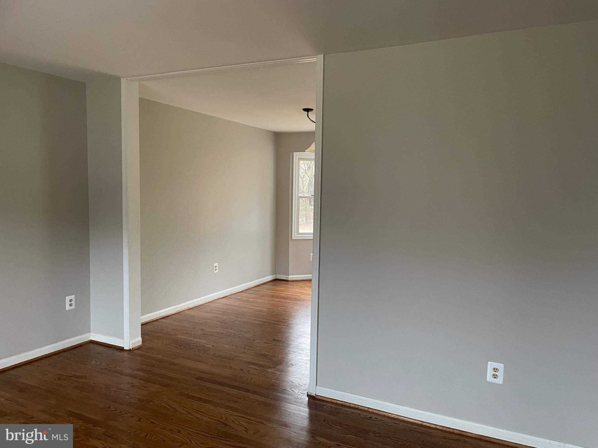 7004 Wick Lane Derwood, MD 20855 - Photo 5 of 19 a view of an empty room and wooden floor