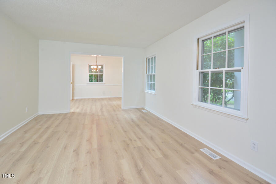 5825 Scalybark Road Durham, NC 27712 - Photo 5 of 44 Huge front room connects to dining room