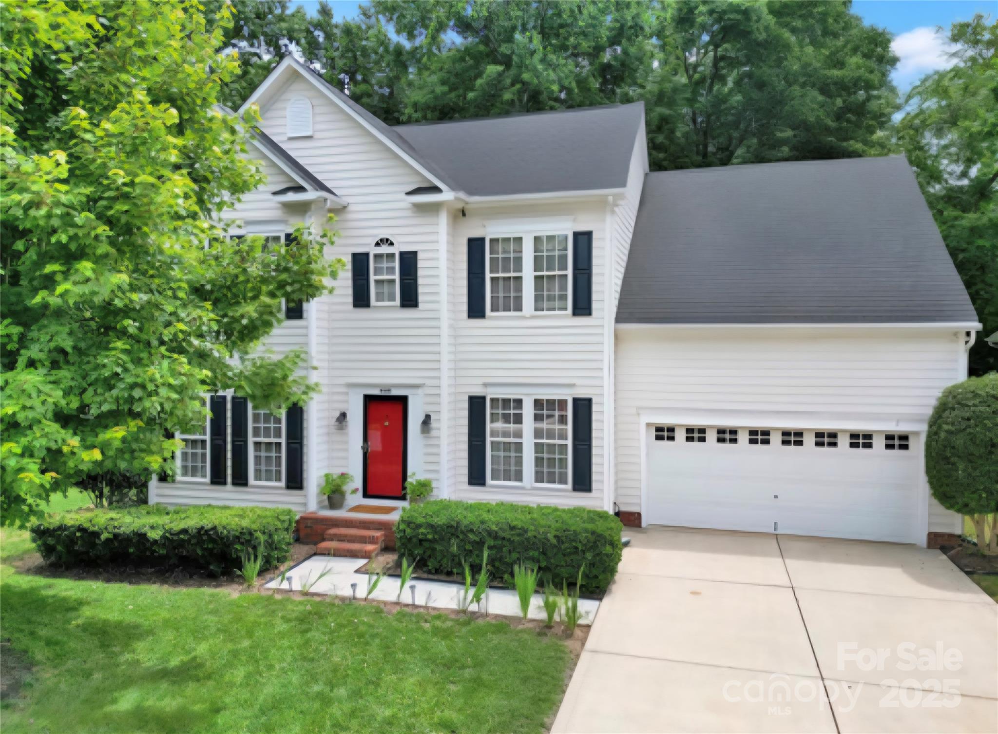 488 St George Road Fort Mill, SC 29708 - Photo 1 of 40 a front view of a house with a yard and garage