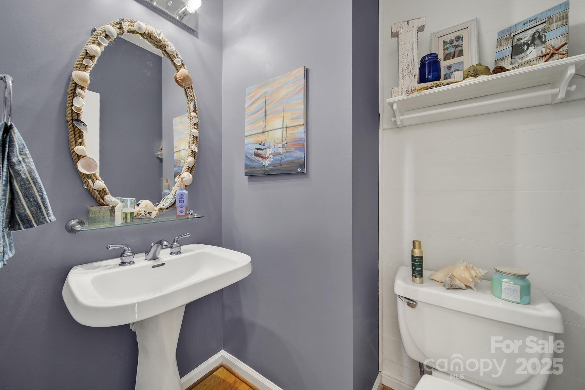 488 St George Road Fort Mill, SC 29708 - Photo 18 of 40 a bathroom with a toilet sink and mirror