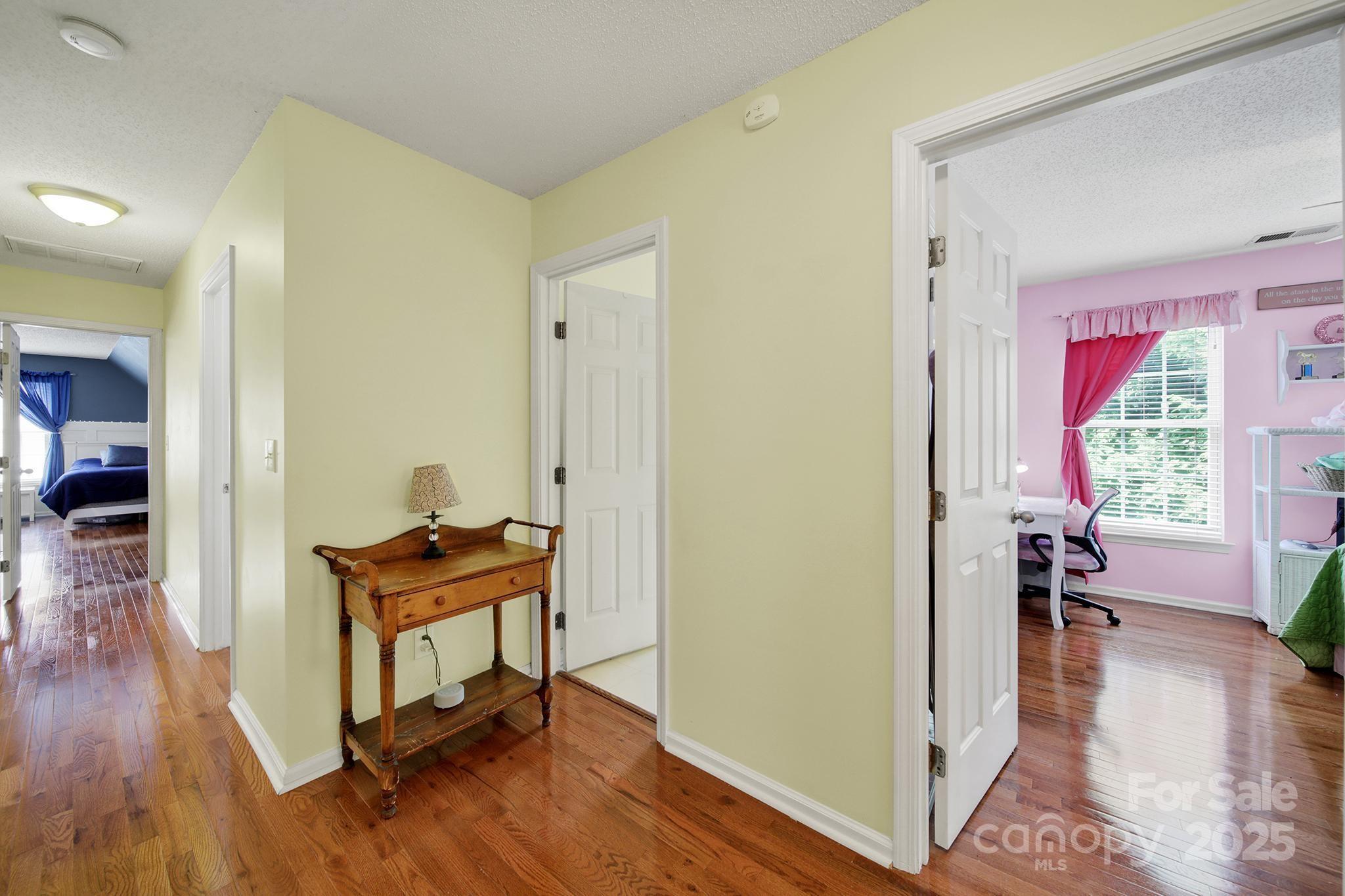 488 St George Road Fort Mill, SC 29708 - Photo 25 of 40 a living room with furniture and a wooden floor