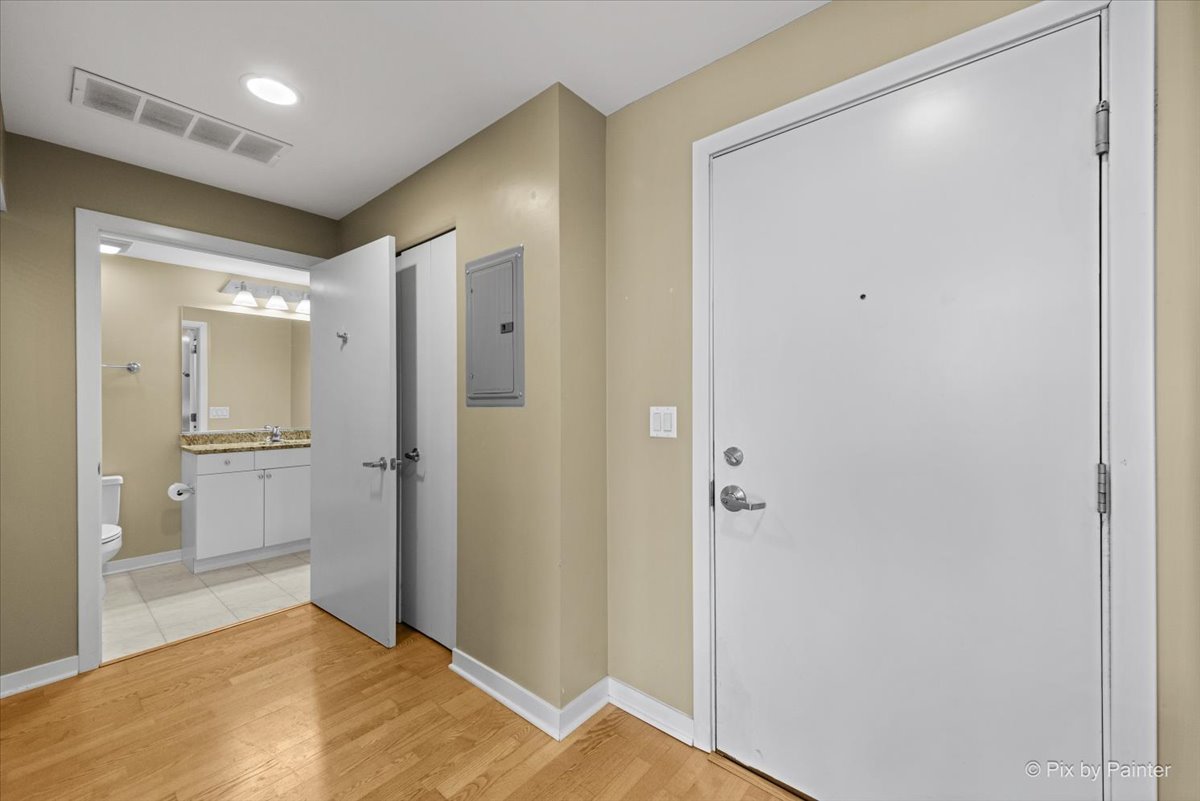 909 West Washington Boulevard, Unit 803 Chicago, IL 60607 - Photo 16 of 21 a bathroom with a shower and a sink