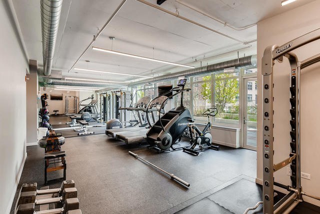 909 West Washington Boulevard, Unit 803 Chicago, IL 60607 - Photo 21 of 21 a view of a room with gym equipment