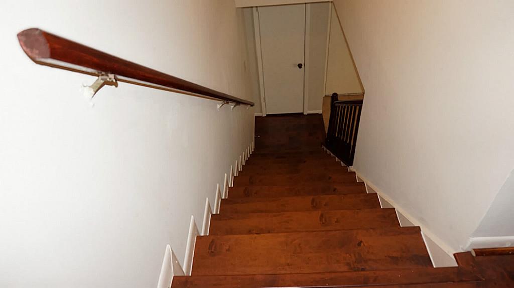 9219 Carousel Lane Houston, TX 77080 - Photo 16 of 31 Stairs to upstairs