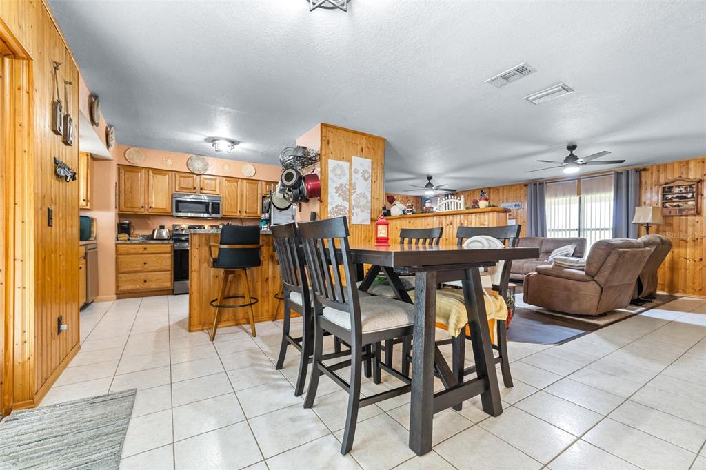 1645 County Road 630 Frostproof, FL 33843 - Photo 17 of 76 a view of a dining room with furniture