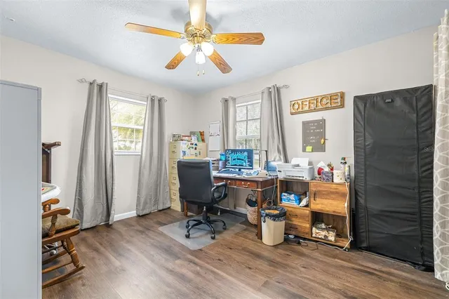 a view of a living room with furniture