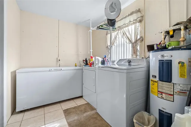 a view of a house with a yard and garage