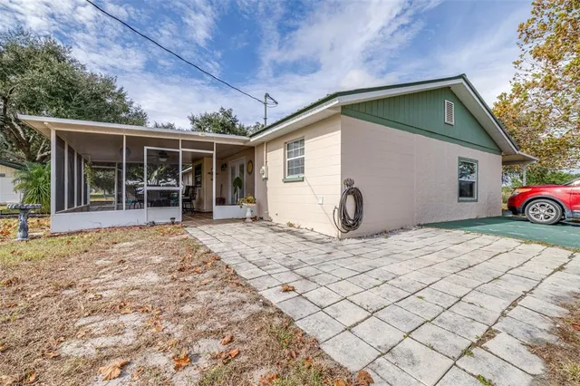 a view of outdoor space with trees all around