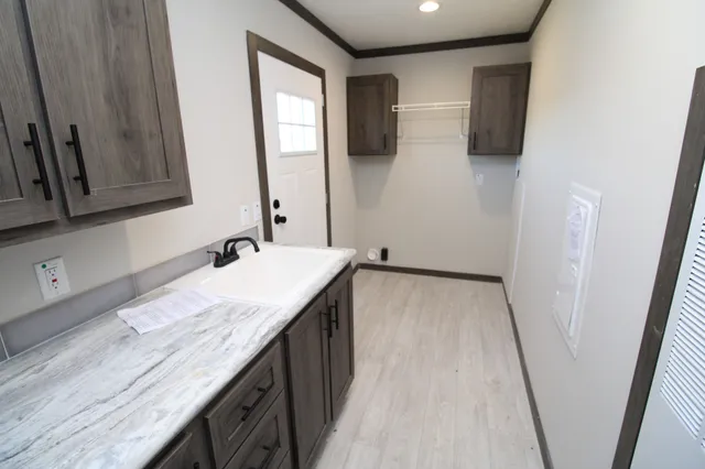 a view of a balcony with wooden floor and fence
