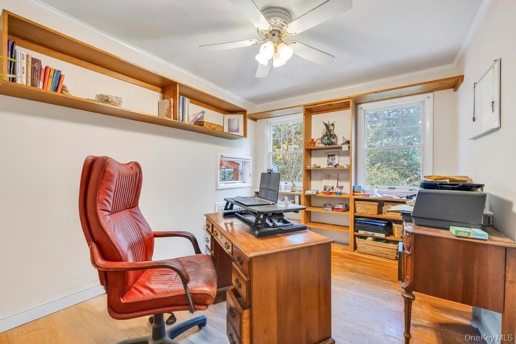 89 Van Brunt Manor Road Setauket, NY 11733 - Photo 40 of 41 a work room with furniture and a window
