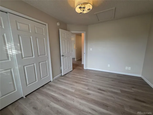 a view of a livingroom with wooden floor