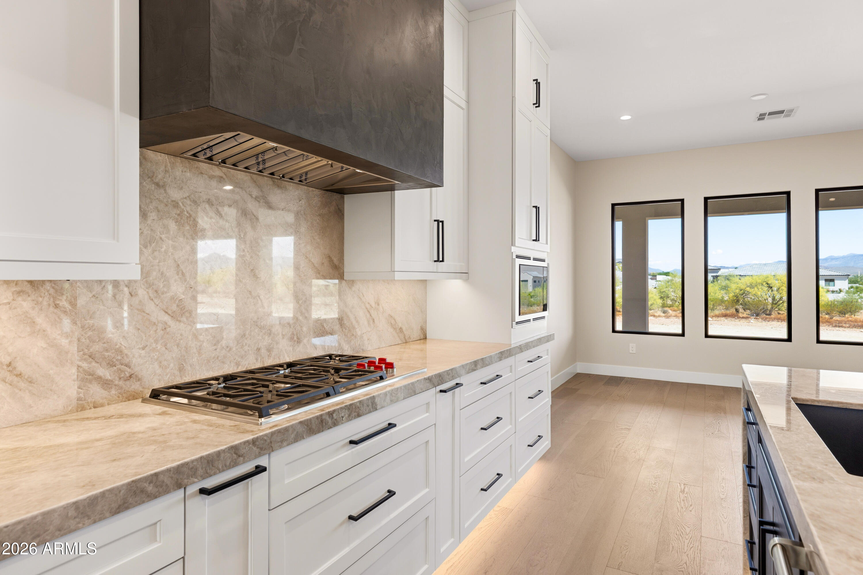 544 East Amber Sun Drive Phoenix, AZ 85085 - Photo 20 of 50 Kitchen Wolf Cooktop