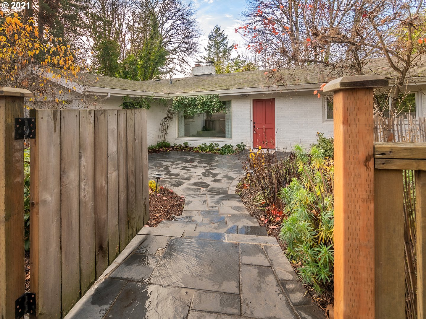 3480 Southwest Talbot Road Portland, OR 97239 - Photo 1 of 32 a view of a house with a yard
