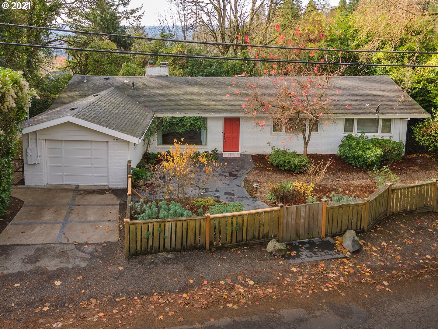 3480 Southwest Talbot Road Portland, OR 97239 - Photo 4 of 32 a view of a house with a yard